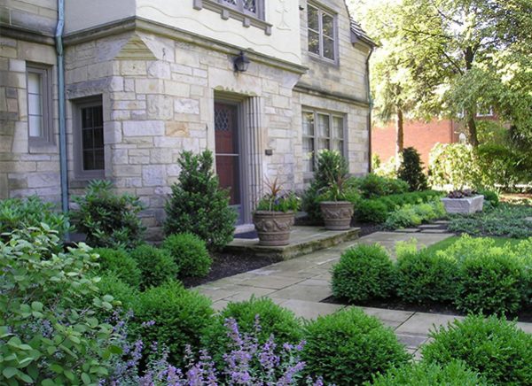 An example of a foundation garden where the shrubs have grown