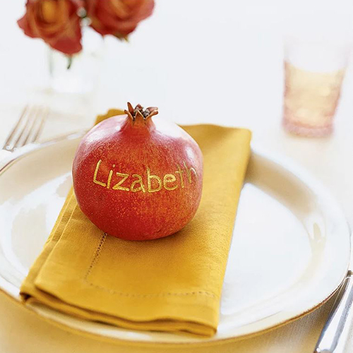 The smooth texture of a pomegranate makes it easy to write legibly with a gold pen