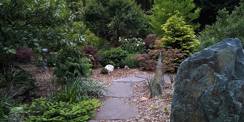 Stones are a repeated motif in this garden